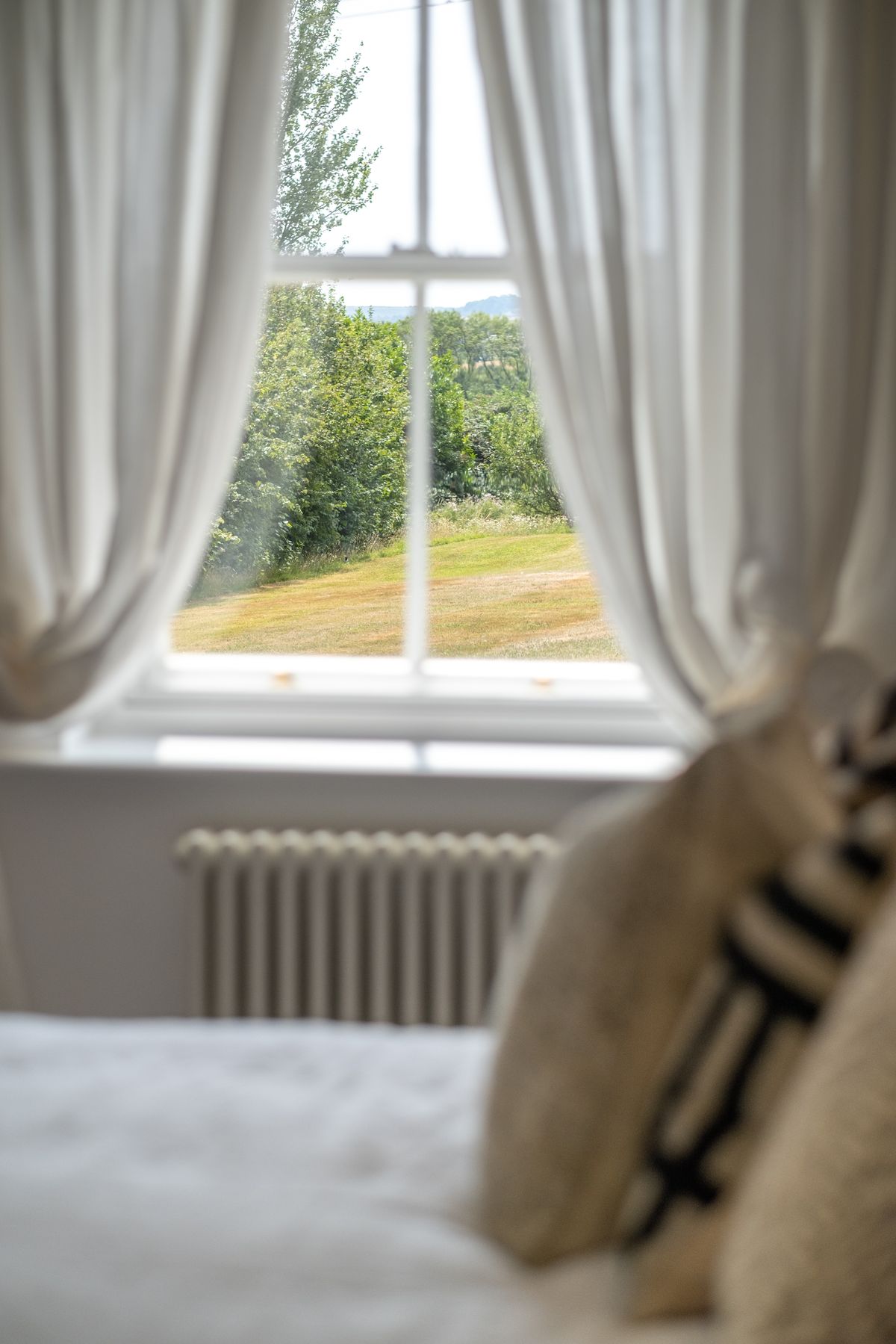 Morning light through a bedroom window